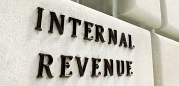 Close up of Internal Revenue sign on side of building