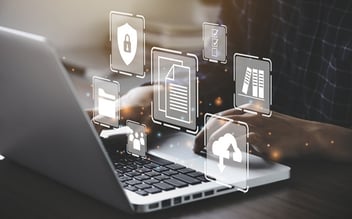 Working on a laptop to build out a business profile