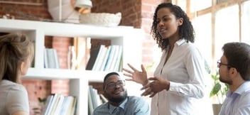 A group of young accountants meeting to discuss issues