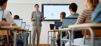 Teacher in front of a class of high school students