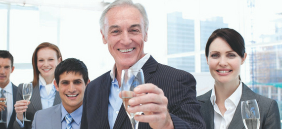 Business team celebrating with champagne