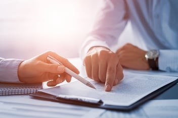 CPA and business owner reviewing potential tax strategies.