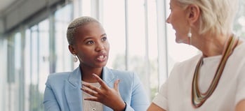 Two CPAs having a calm discussion over a difficult subject.