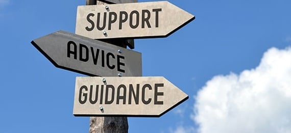Signpost pointing in the directions of Support, Advice, and Guidance