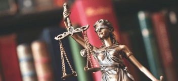 Close up of statue of lady justice and her scales