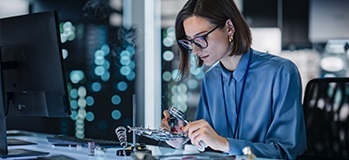 Researcher working on a project at her desk